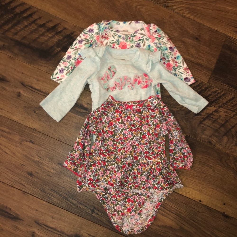 3 Floral onsies.